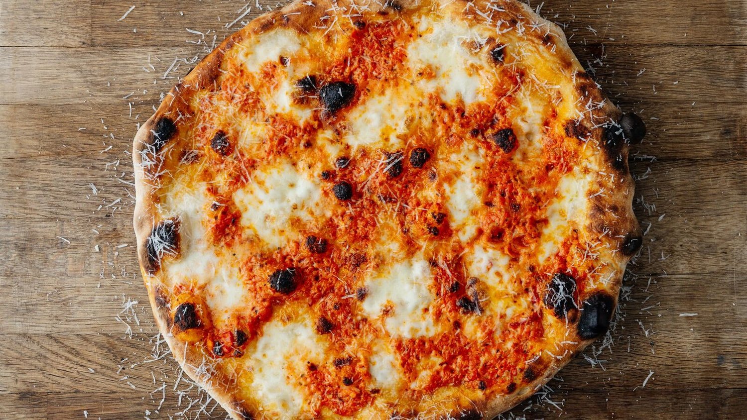 Vodka Pizza on a wooden board recipe poster image